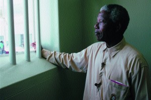 Nelson Mandela in the cell that was once his only home.